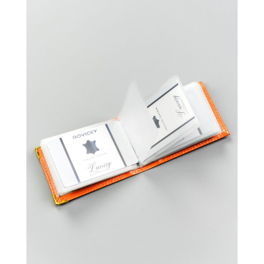 Otwarte pomarańczowe etui 301 z kartami
