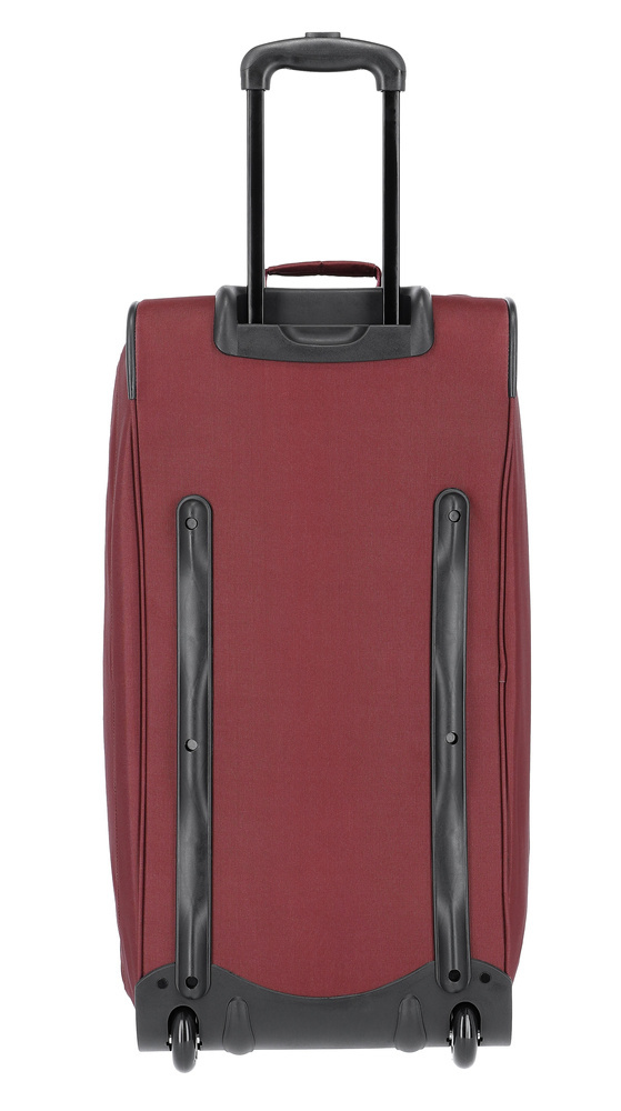 Bordowa torba Travelite Basics 89 l postawiona pionowo, od tyłu z uchwytem teleskopowym i kółkami