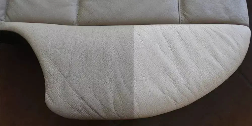 Środek do czyszczenia delikatny skór gładkich Leather Expert - boczek siedziska przed i po czyszczeniu, zbliżenie