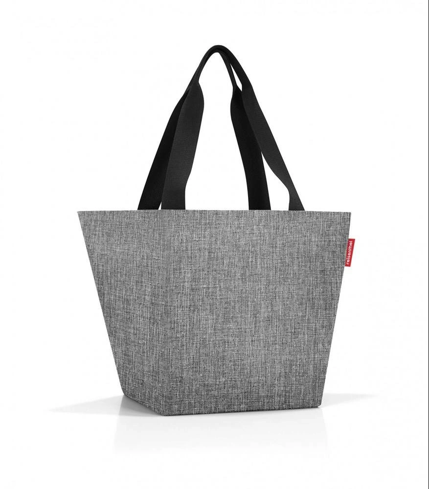 Szara torba na zakupy Reisenthel shopper M z dwiema czarnymi rączkami, ujęta pod kątem